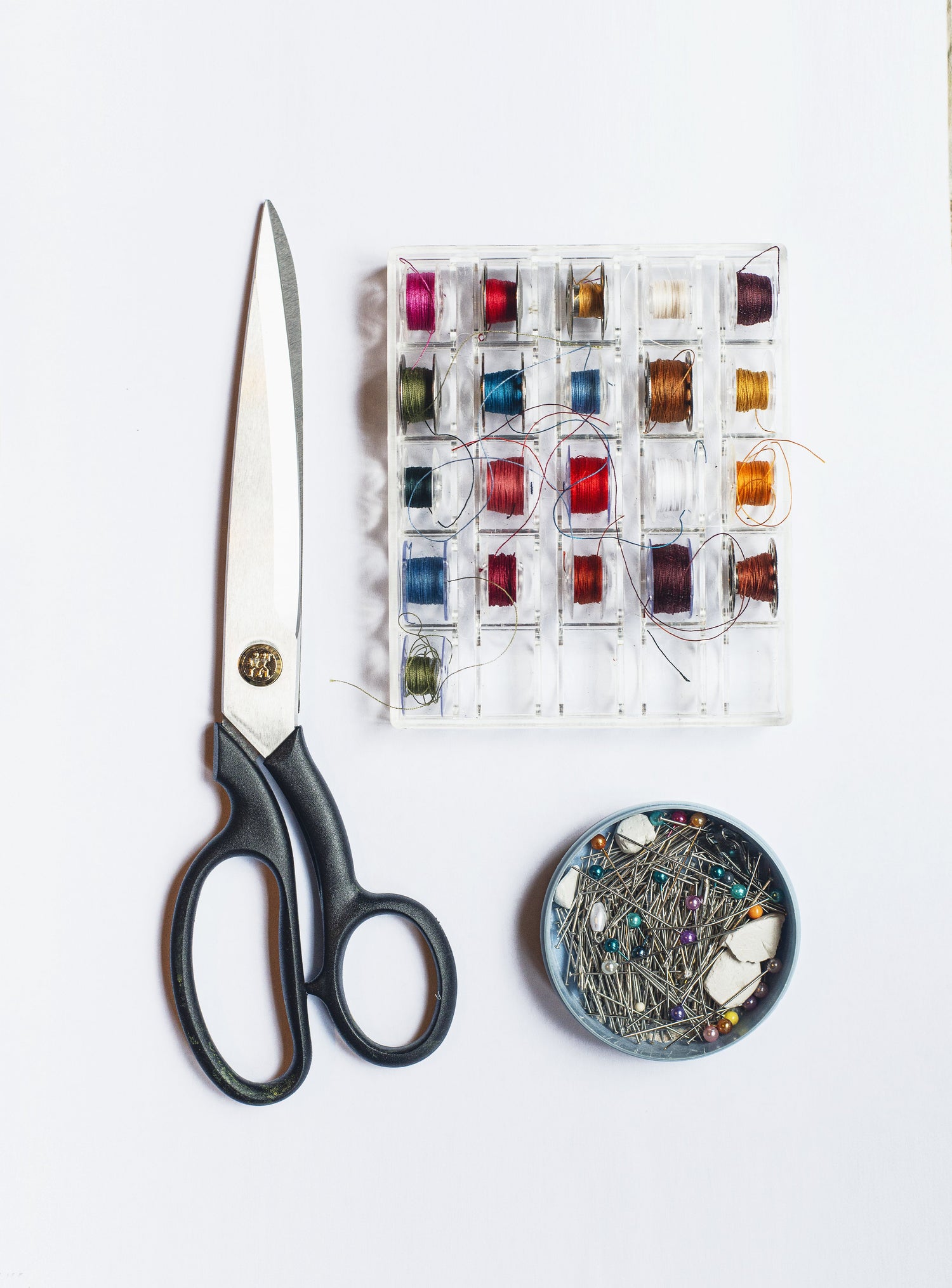Sewing scissors and notions (thread and pins). Every Epicute Pouch is made by hand.