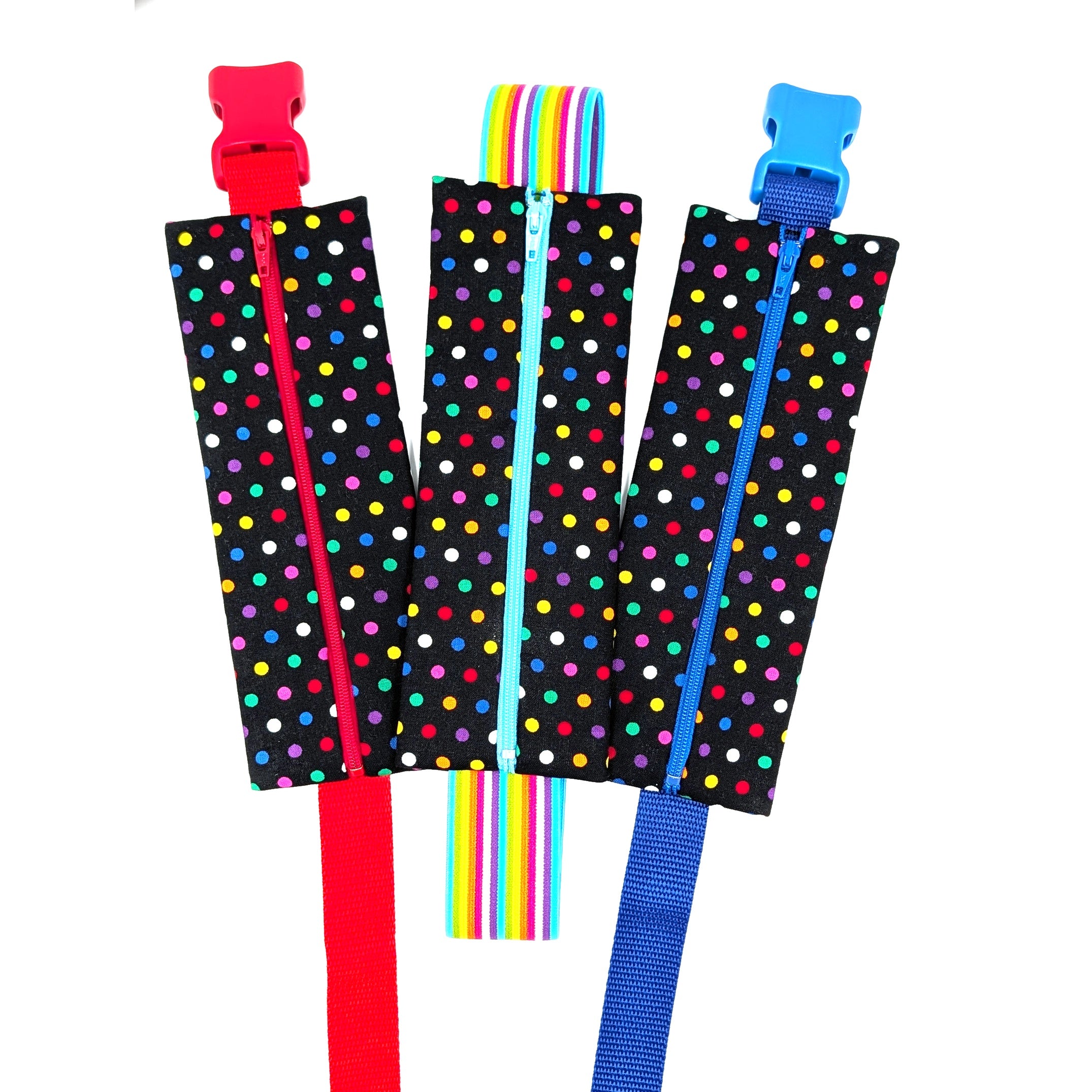 The Daydreamer EpiPen pouch in a black confetti dot print shown with all three strap options, closed