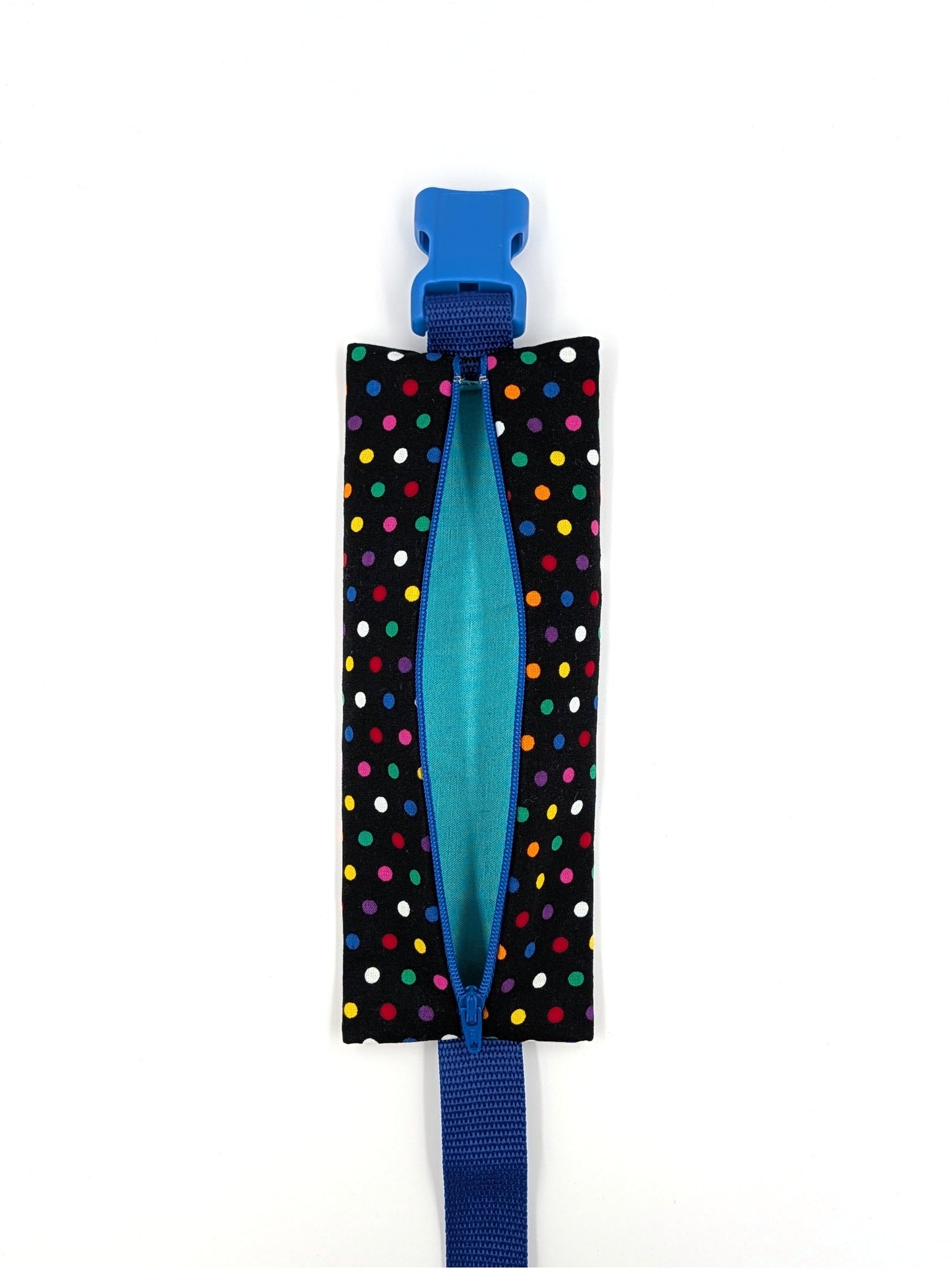 The Daydreamer EpiPen pouch in a black confetti dot print with the blue adjustable belt, unzipped and empty, showing the teal liner