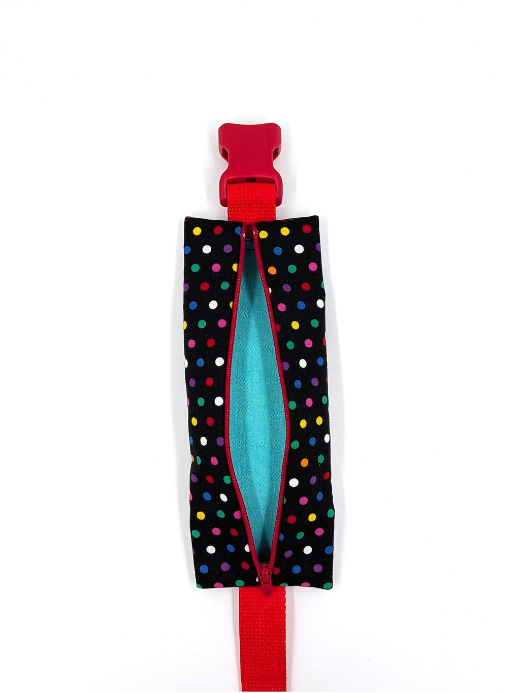 The Daydreamer EpiPen pouch in a black confetti dot print with the red adjustable belt, unzipped and empty, showing the teal liner
