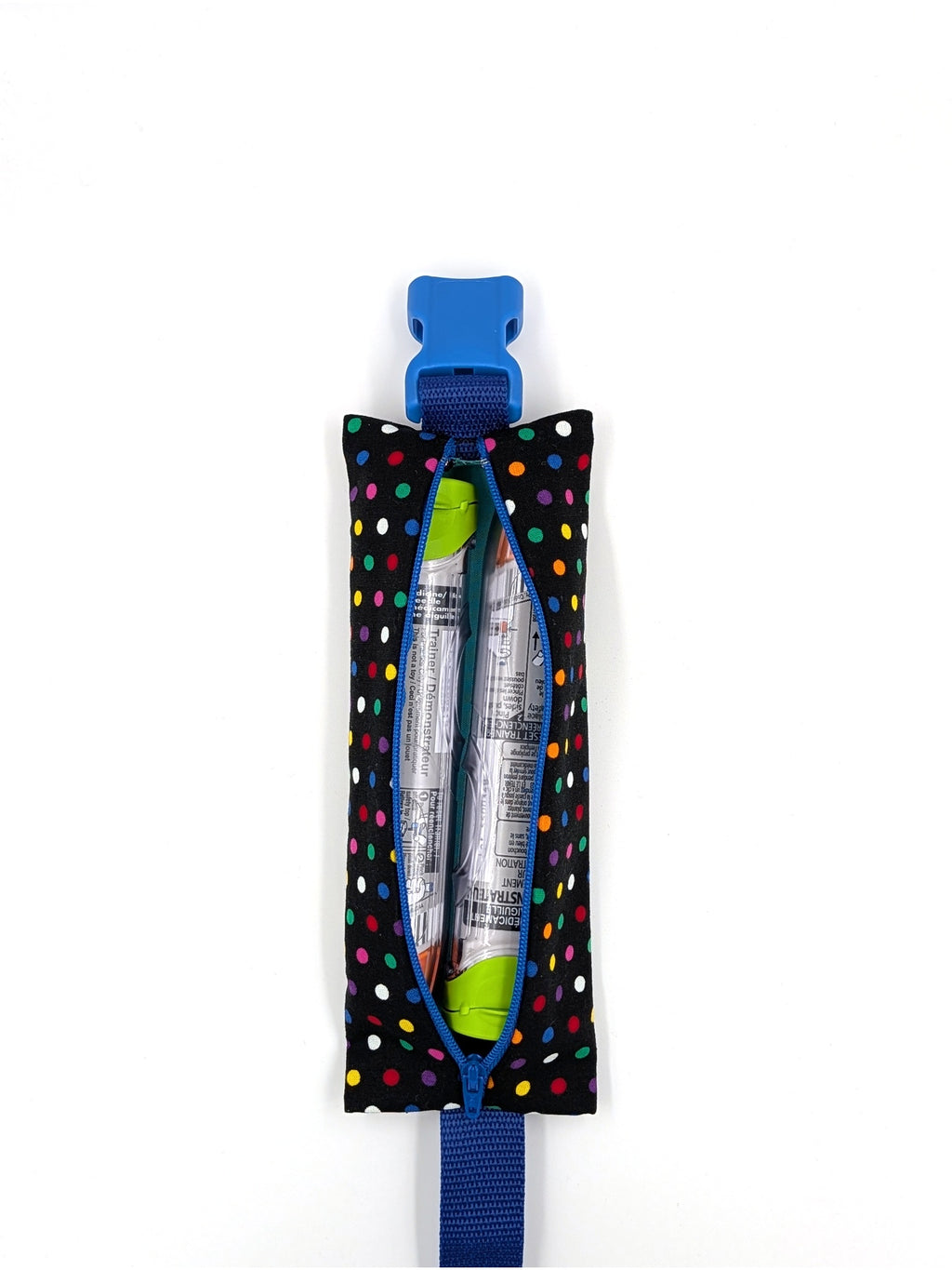 The Daydreamer EpiPen pouch in a black confetti dot print with the blue adjustable belt, open with an auto-injector and an Emerade inside