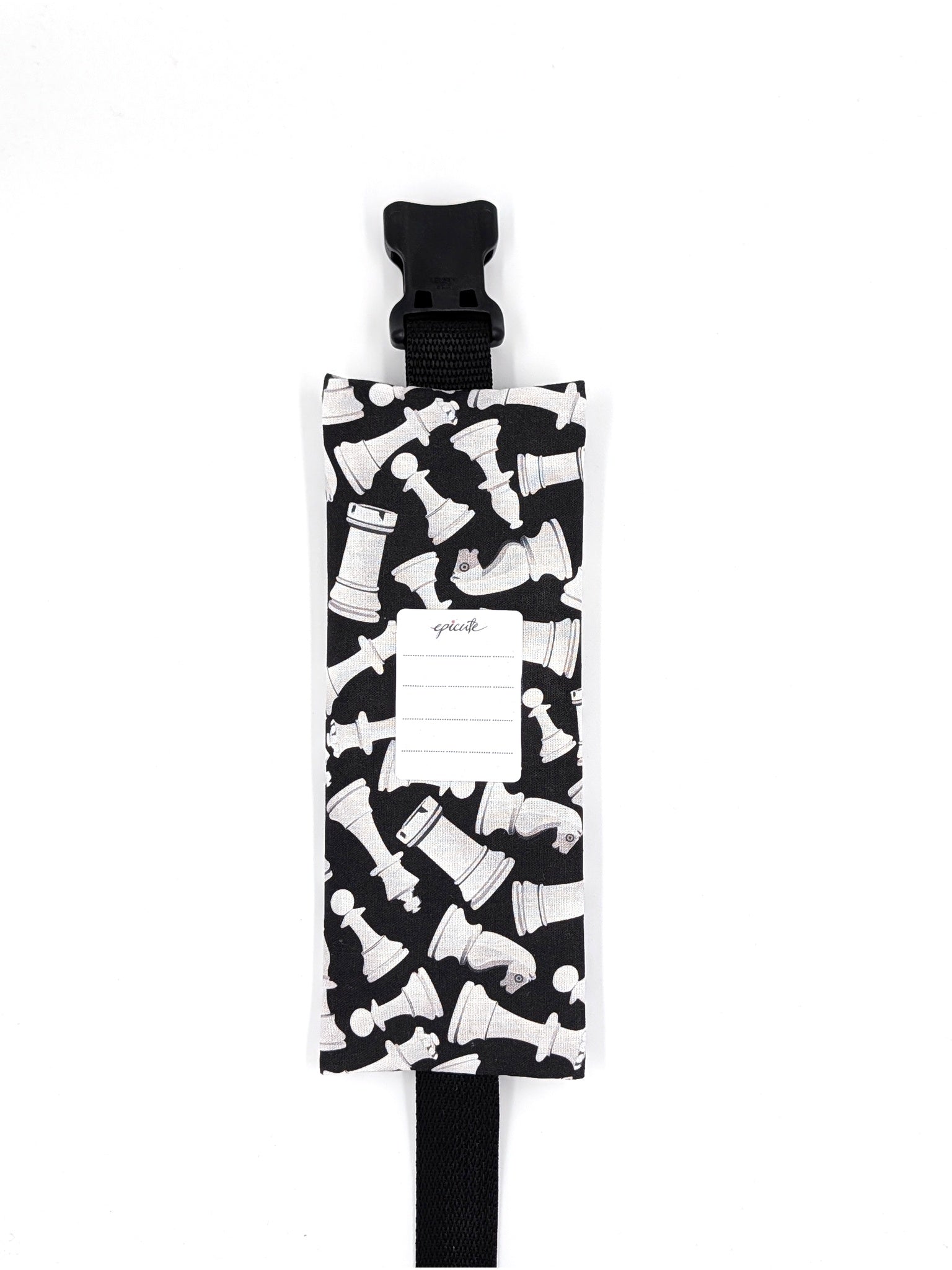 The Grand Master EpiPen pouch in a black and white chess print, back view, showing the care label