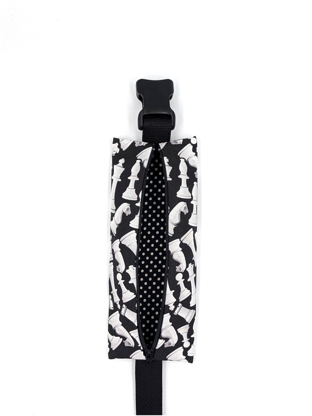 The Grand Master EpiPen pouch in a black and white chess print, unzipped and empty, showing the interior liner