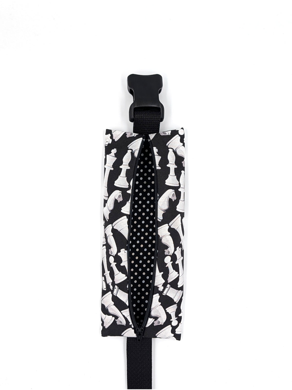 The Grand Master EpiPen pouch in a black and white chess print, unzipped and empty, showing the interior liner