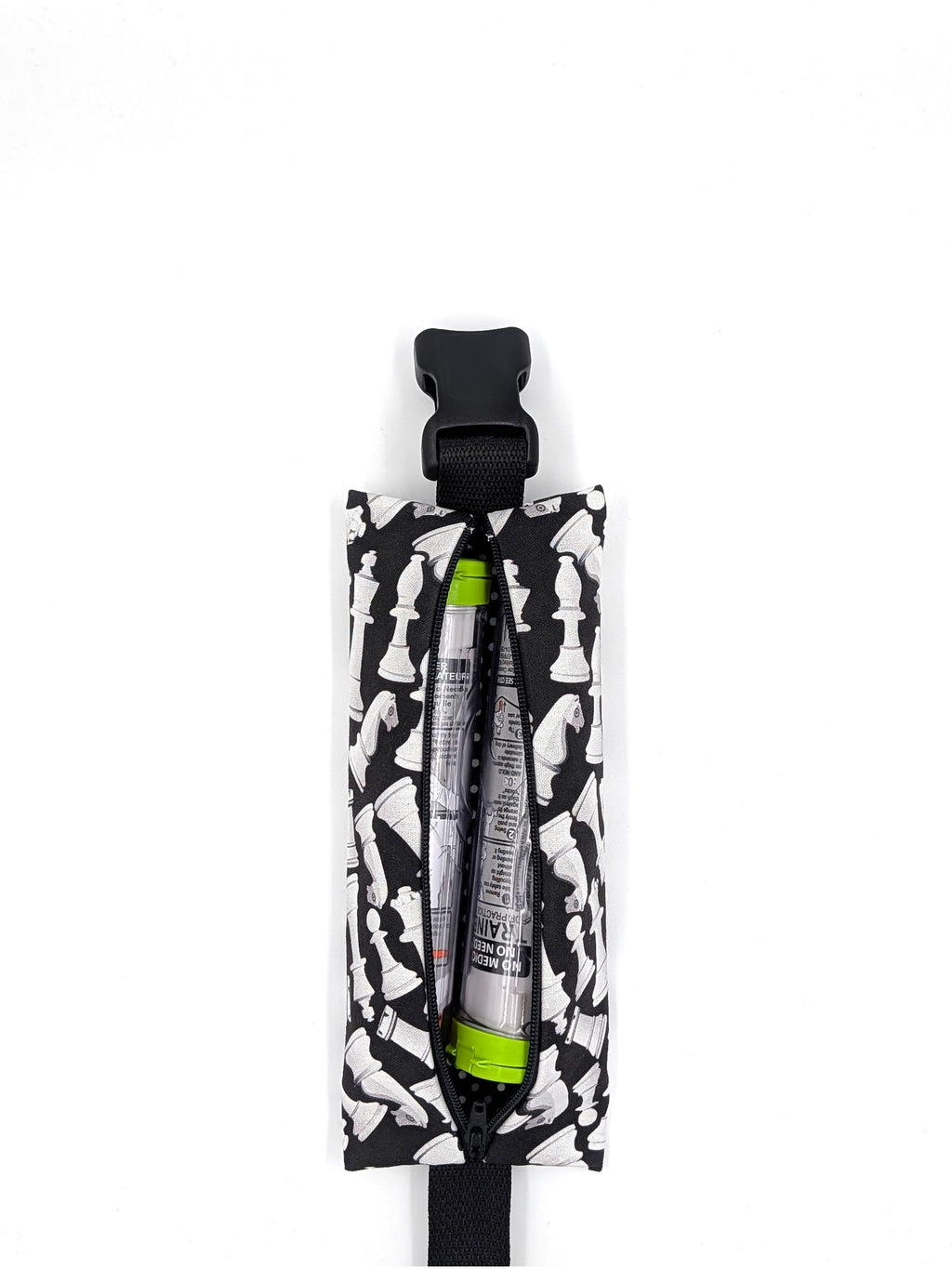 The Grand Master EpiPen pouch in a black and white chess print, open with two EpiPen auto-injectors inside