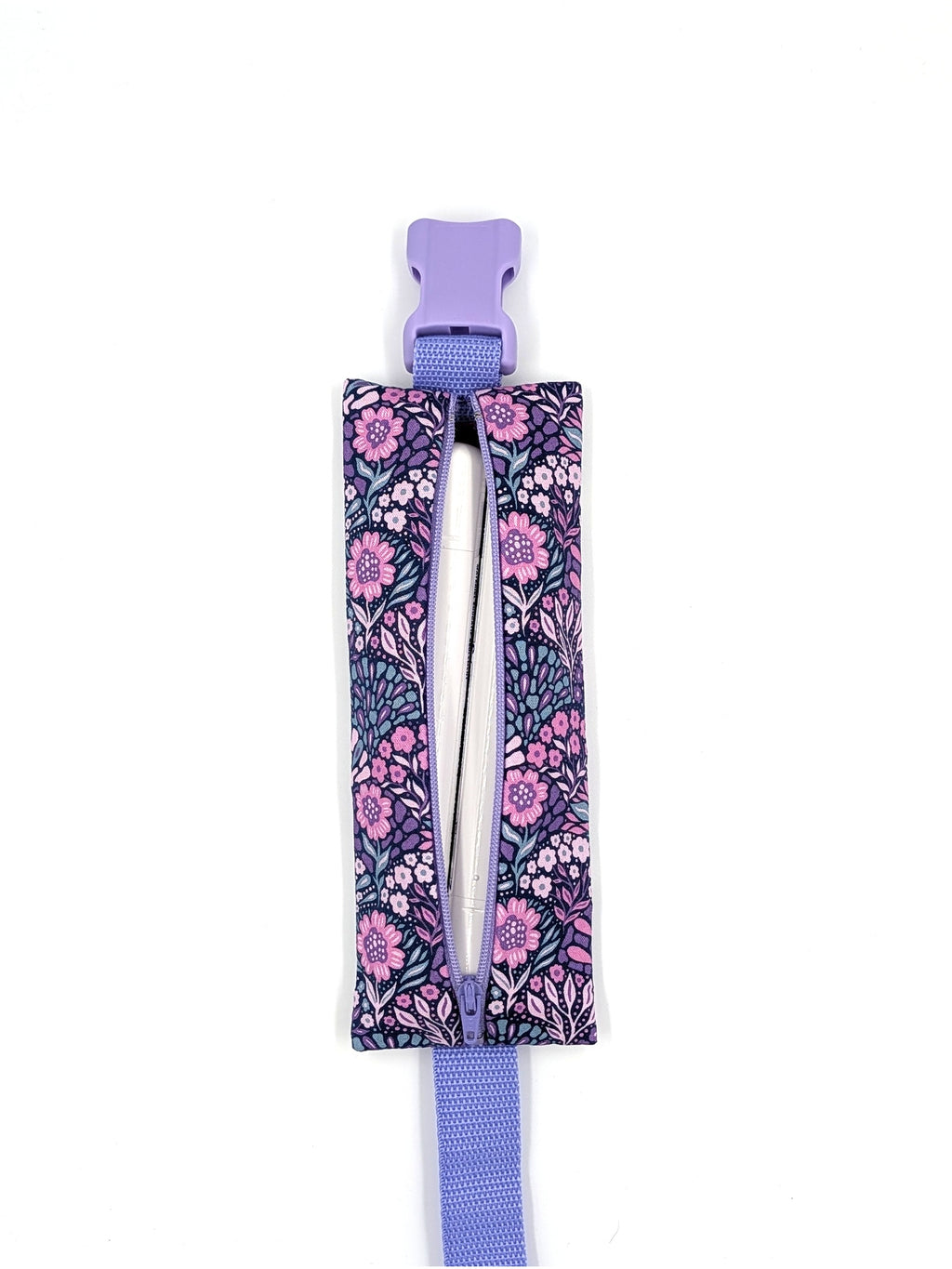 The Poet EpiPen pouch in a navy floral print, open with two EpiPen auto-injectors inside
