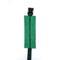 The Scout EpiPen pouch in an emerald green starburst print, closed, shown with its adjustable belt