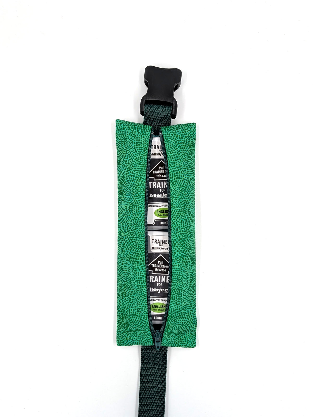 The Scout EpiPen pouch in an emerald green starburst print, open with two ALLERJECT auto-injectors inside